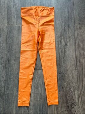 Koral High-Rise Shiny Orange Leggings